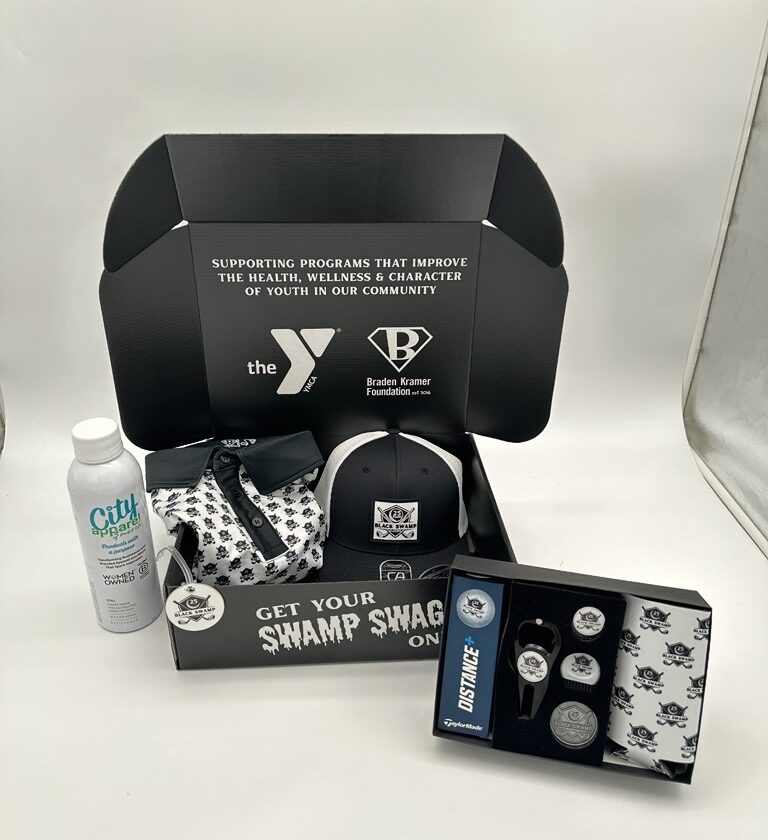 The branded merch created to support the Black Swamp Classic golf tournament. Includes a custom branded polo, hat, koozie, and bottle opener.
